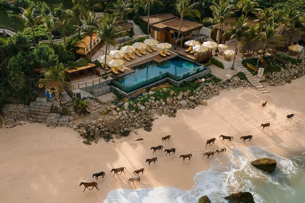 Aerial view of NIHI Sumba resort beside the ocean